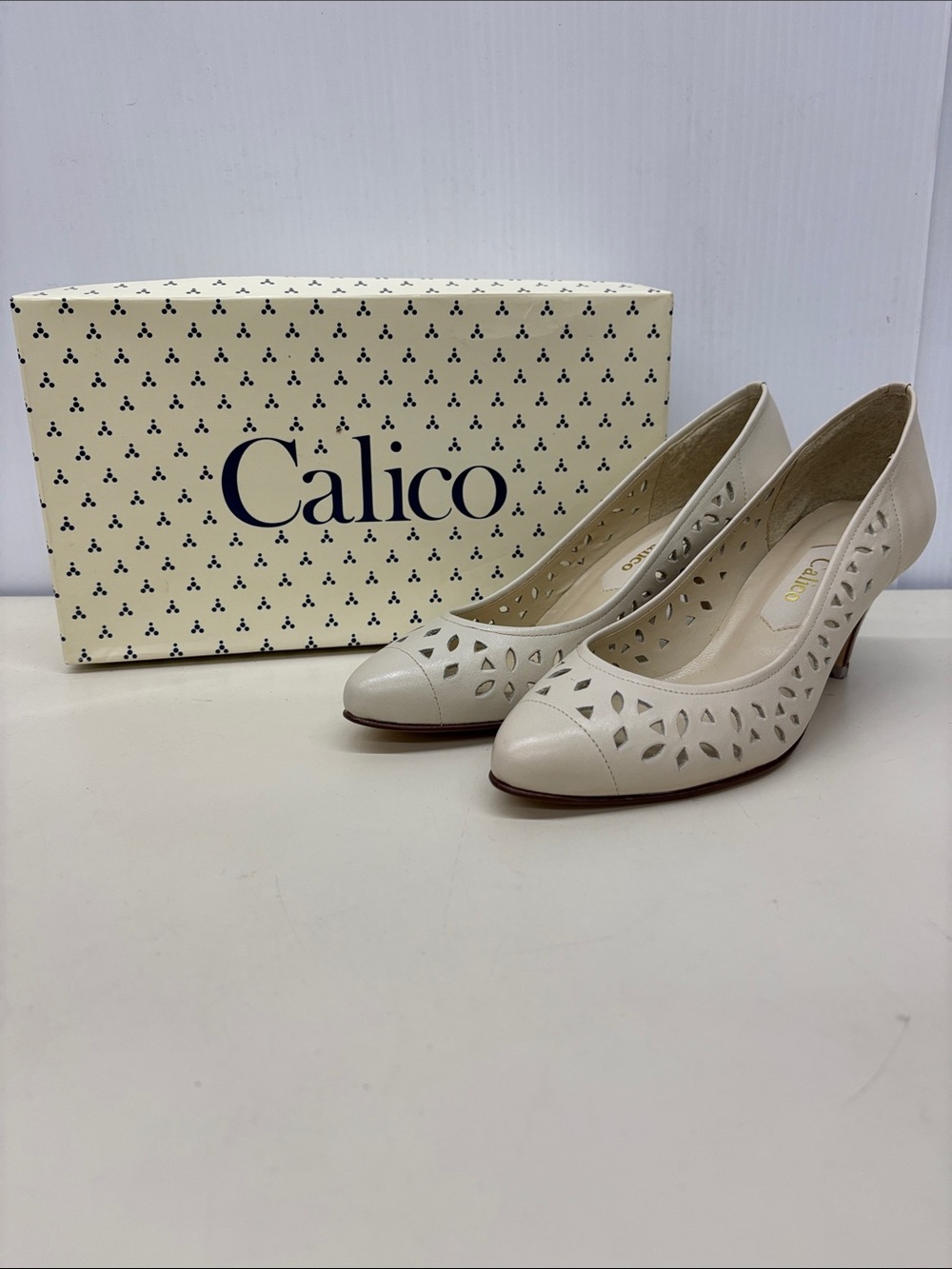 Calico Women's Ivory Leather Cutout Heels